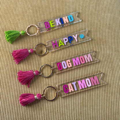 Keychain - Clear Tassel Happy